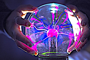 Closeup of a plasma globe in the darkness